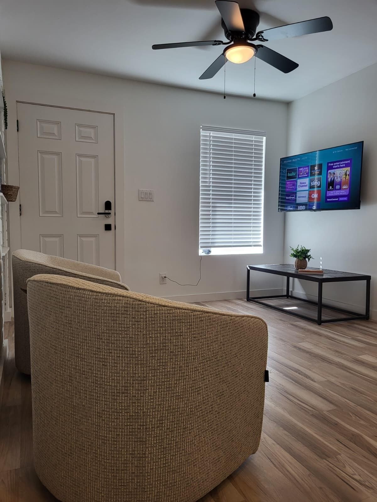 McFadden Pad furnished living room with television and seating