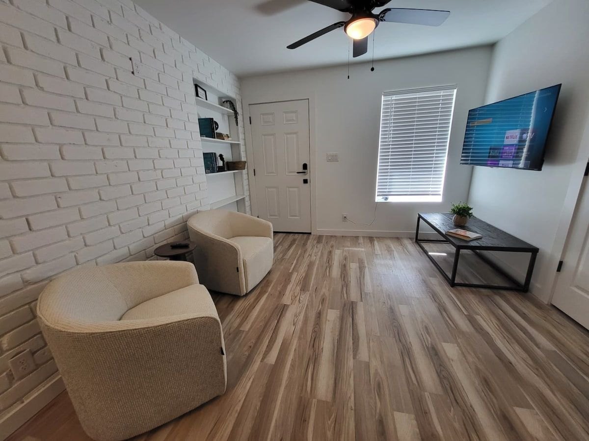McFadden Pad furnished living room with table and chairs